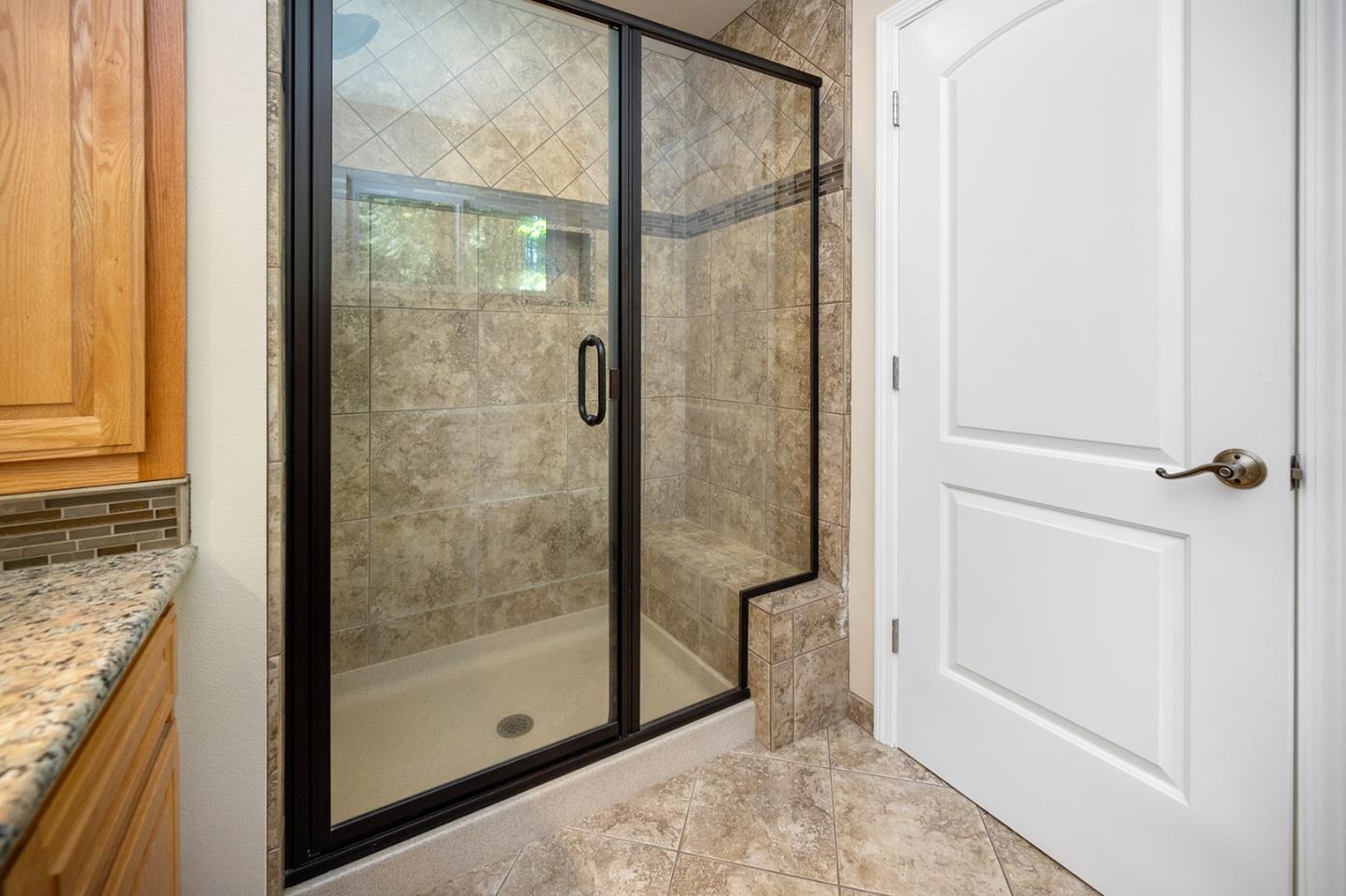 2271 Murphys Drive Arnold, CA 95223 - Photo 63 of 91 a bathroom with a glass shower door