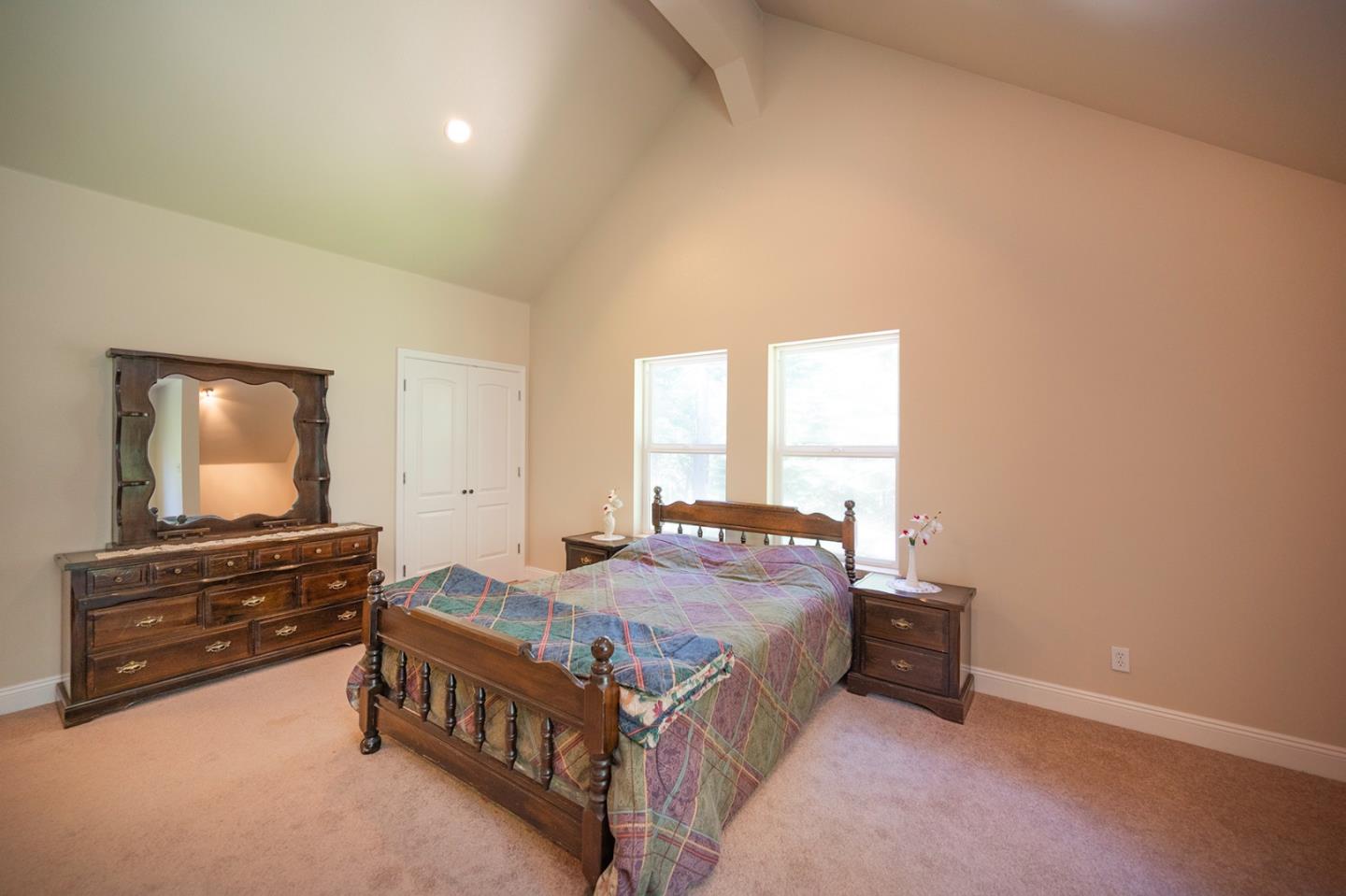 2271 Murphys Drive Arnold, CA 95223 - Photo 71 of 91 a bedroom with a bed and a flat screen tv
