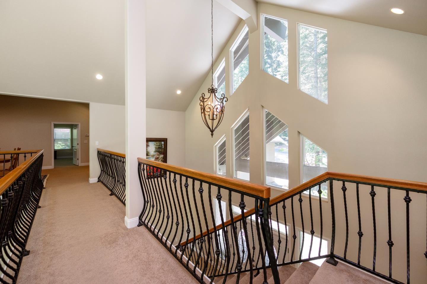 2271 Murphys Drive Arnold, CA 95223 - Photo 76 of 91 a view of staircase with lots of frames on wall and a window