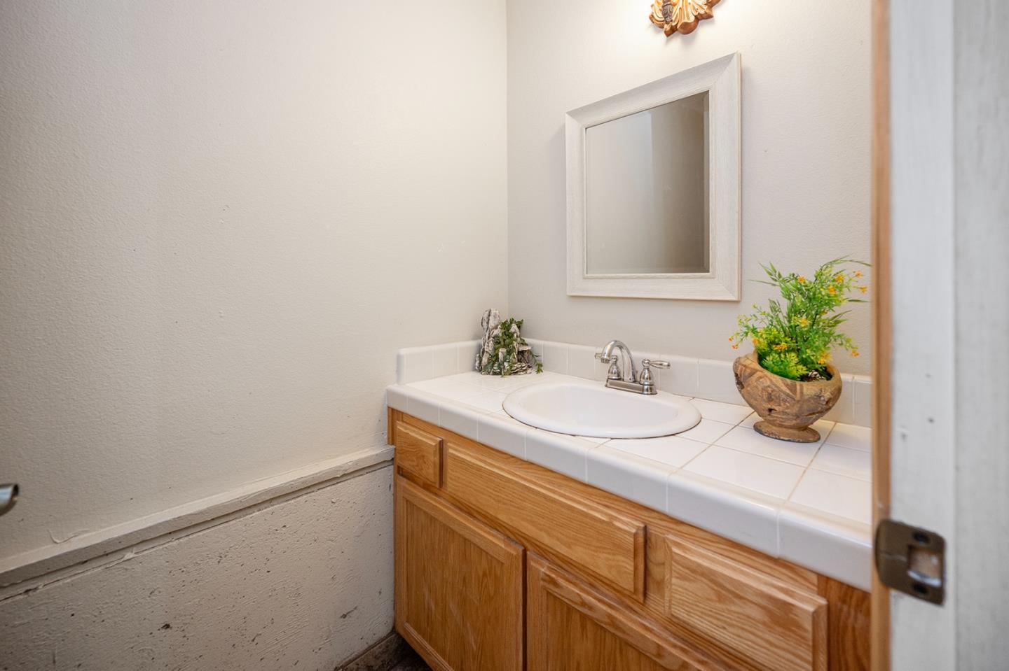 2271 Murphys Drive Arnold, CA 95223 - Photo 77 of 91 a bathroom with a sink and a mirror