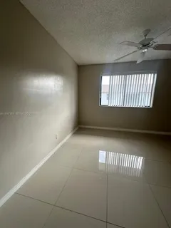 en empty room with windows