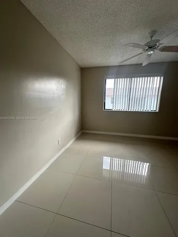 en empty room with windows