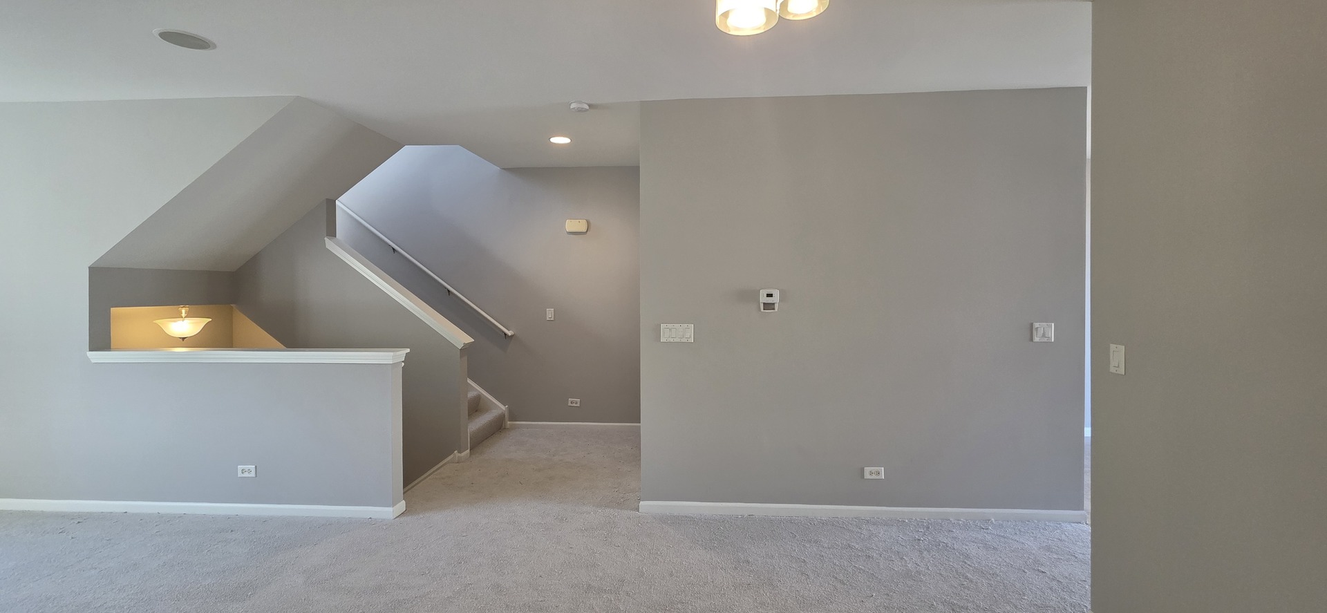 4313 Timber Ridge Court Joliet, IL 60431 - Photo 11 of 24 a view of an empty room with wooden floor and windows