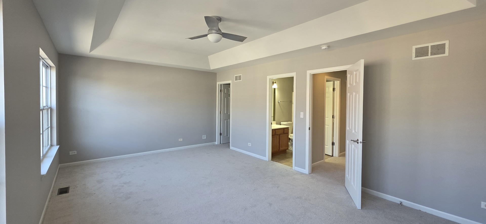 4313 Timber Ridge Court Joliet, IL 60431 - Photo 17 of 24 a view of empty room with a ceiling fan