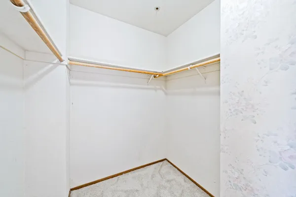 a bathroom with a sink a mirror and a shower