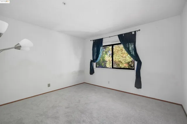 a bathroom with a shower and a toilet