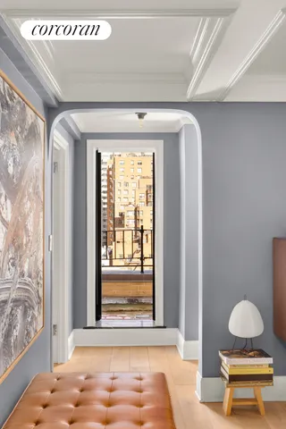 a front view of a house with a large window