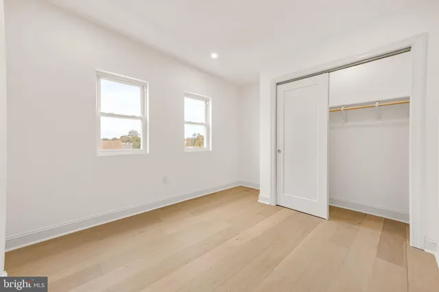a view of a hallway with an entryway