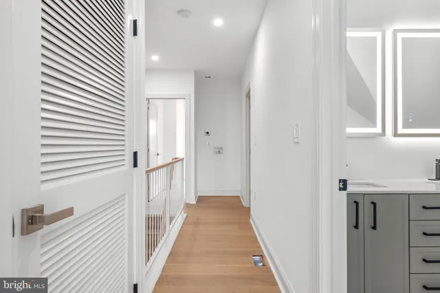 a view of an empty room with stairs
