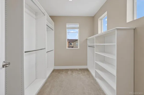 a view of an empty walk in closet