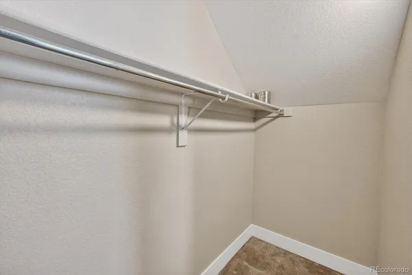 a view of small space with racks on the wall