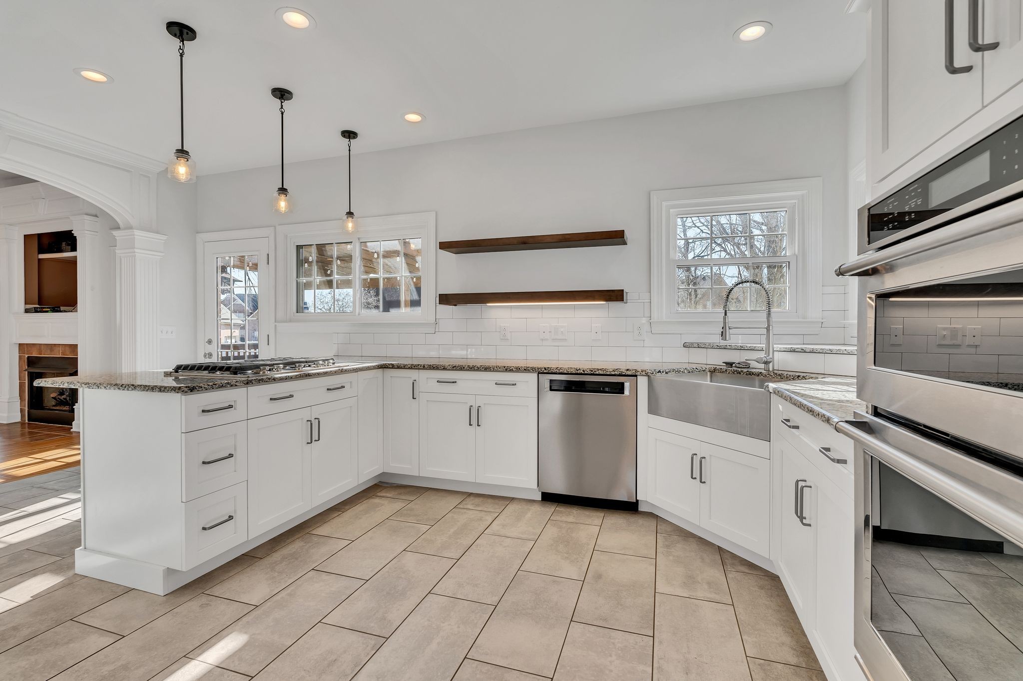 3033 Tybee Trail Murfreesboro, TN 37127 - Photo 16 of 41 a kitchen with granite countertop a sink stainless steel appliances and cabinets