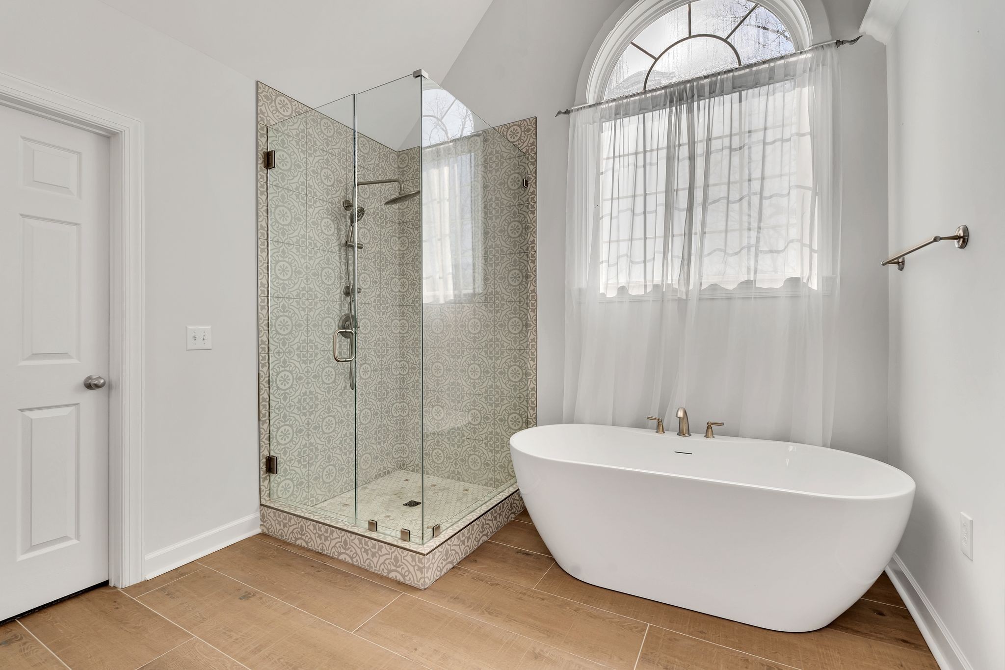 3033 Tybee Trail Murfreesboro, TN 37127 - Photo 21 of 41 a bathroom with a tub and a shower