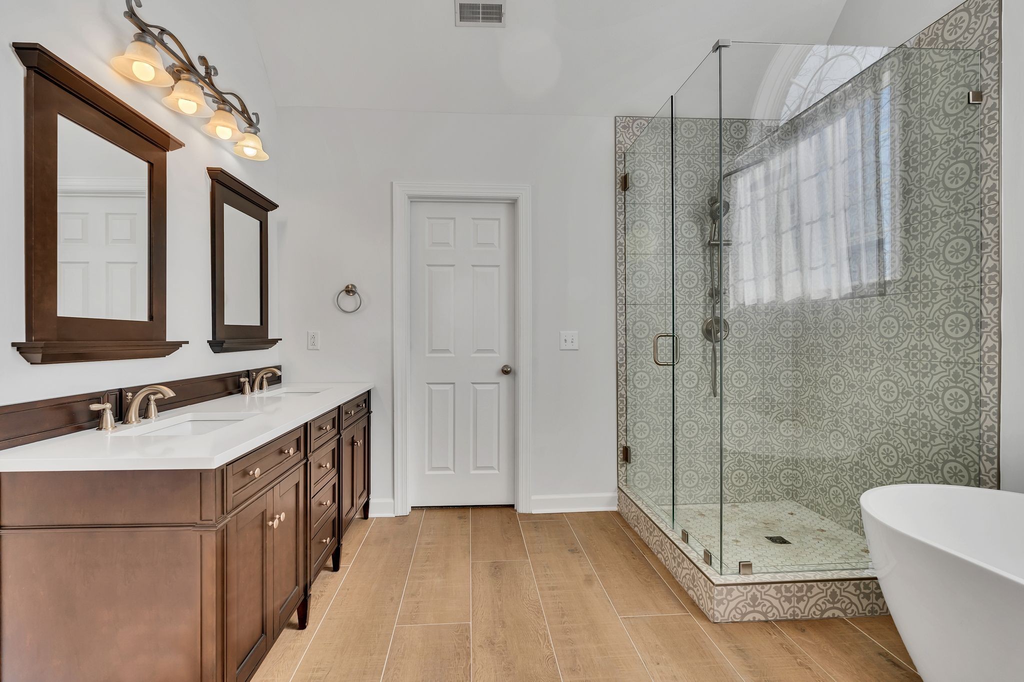 3033 Tybee Trail Murfreesboro, TN 37127 - Photo 22 of 41 a bathroom with a double vanity sink toilet mirror and shower