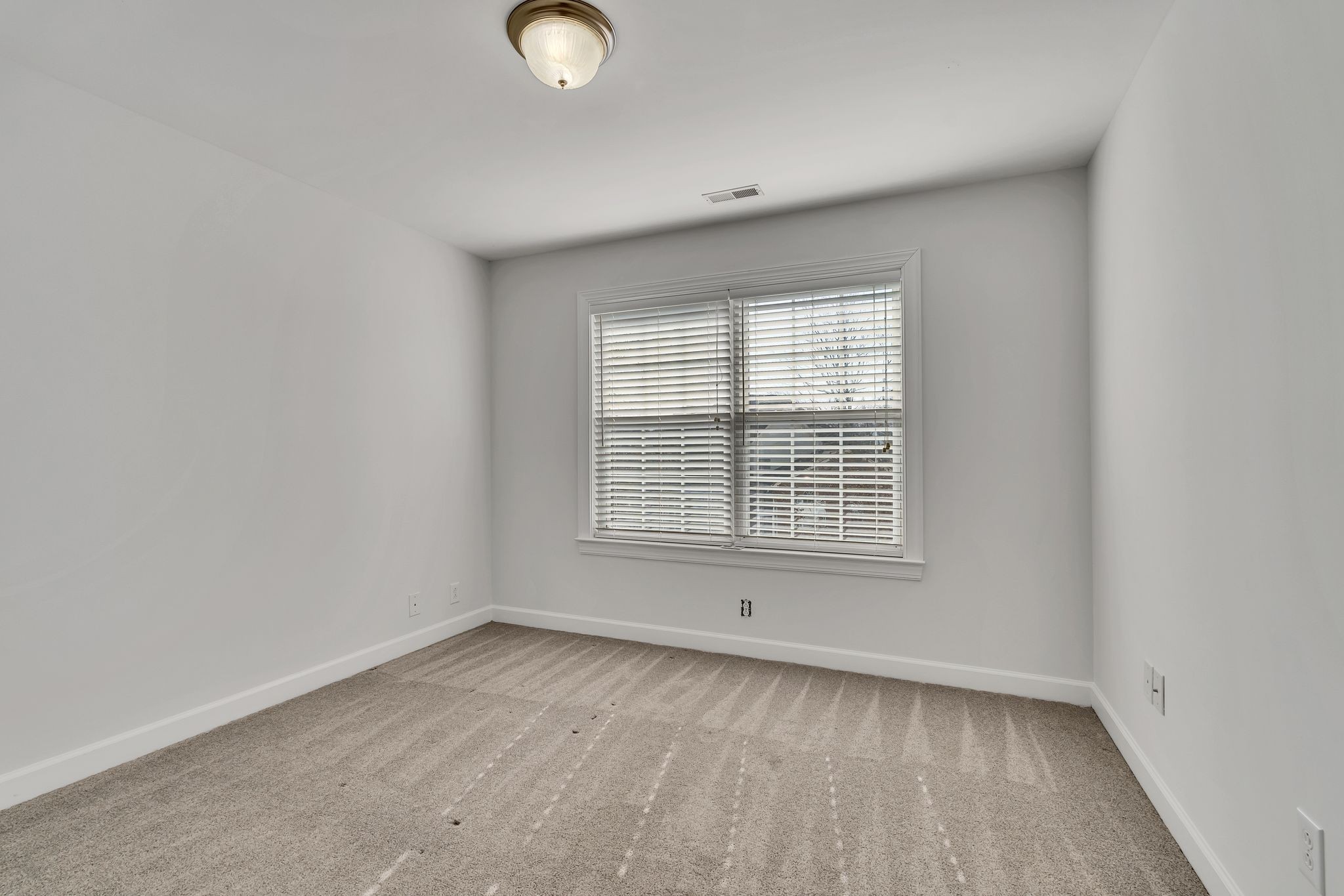 3033 Tybee Trail Murfreesboro, TN 37127 - Photo 28 of 41 an empty room with wooden floor and windows
