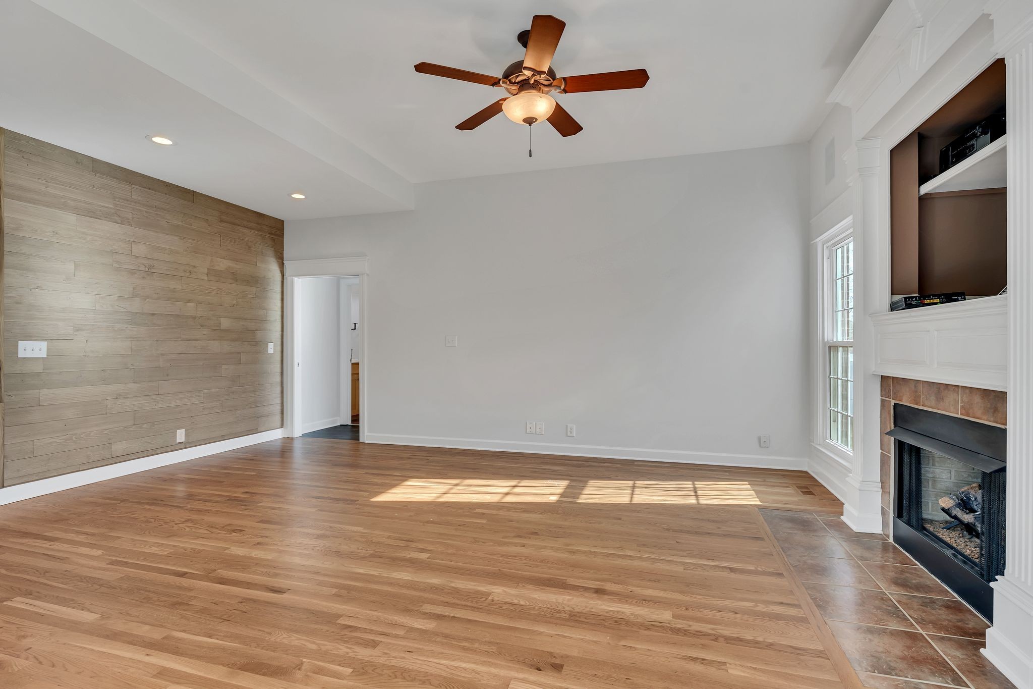 3033 Tybee Trail Murfreesboro, TN 37127 - Photo 7 of 41 a view of empty room with wooden floor and fan