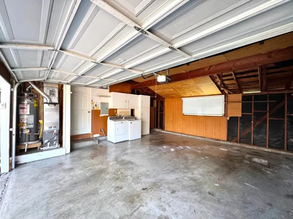 a view of a room with wooden walls