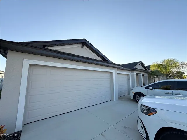 a car parked in front of a house