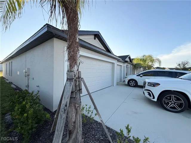 a car parked in front of a house