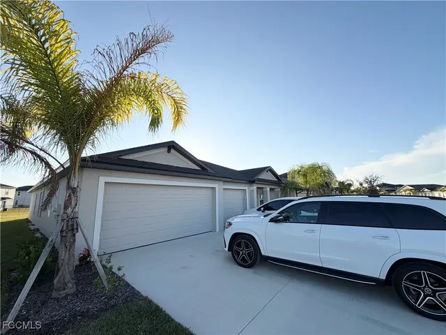 a view of outdoor space with playground and green space