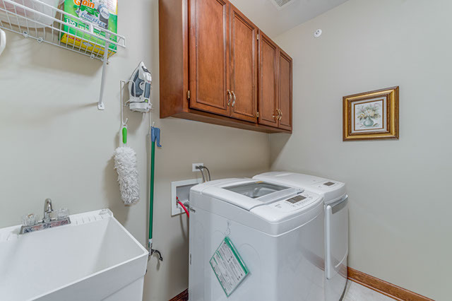 4N446 School Road St. Charles, IL 60175 - Photo 16 of 25 a bathroom with a sink a vanity and a window