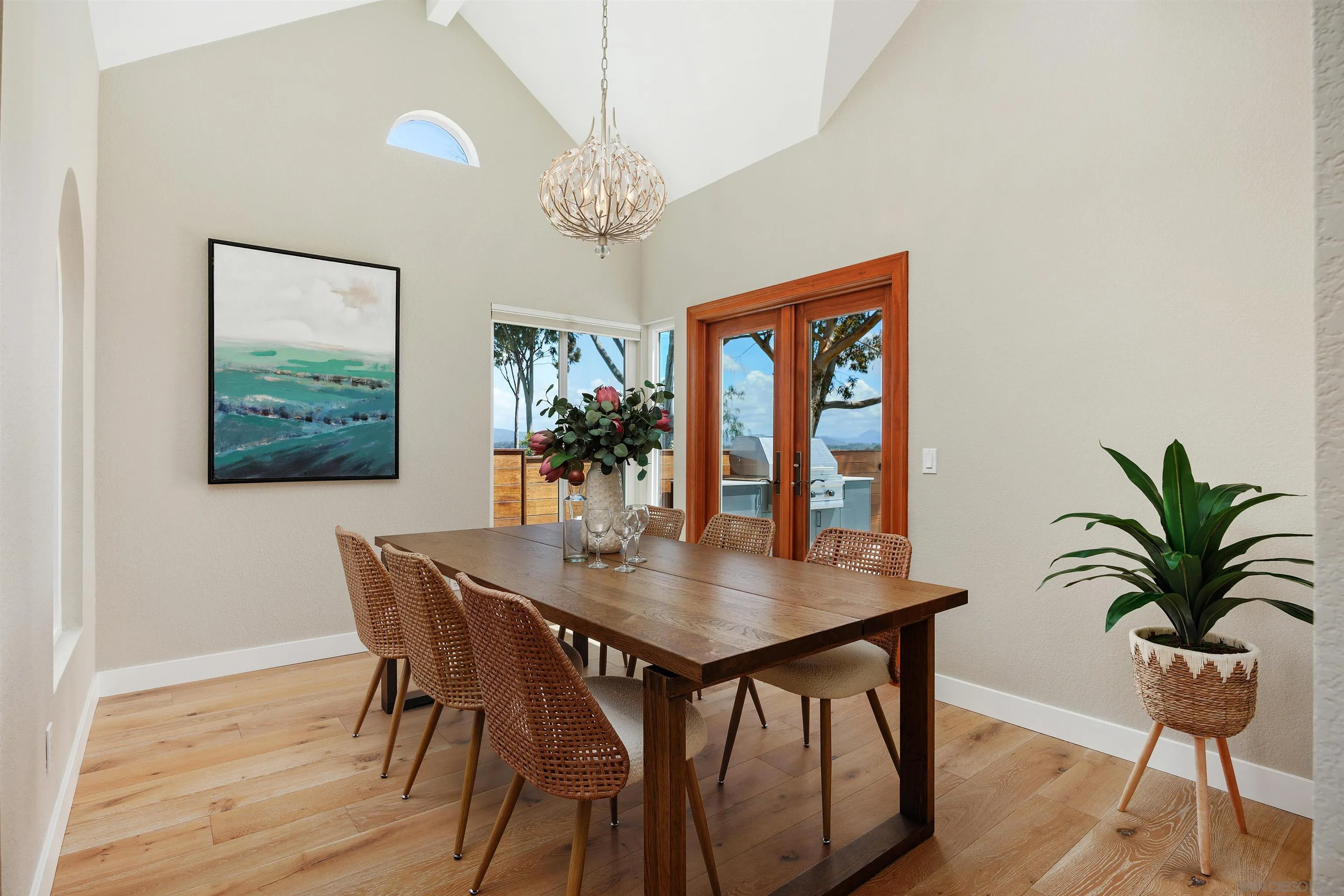1533 Pacific Ranch Drive Encinitas, CA 92024 - Photo 10 of 52 a view of a dining room with furniture window and wooden floor