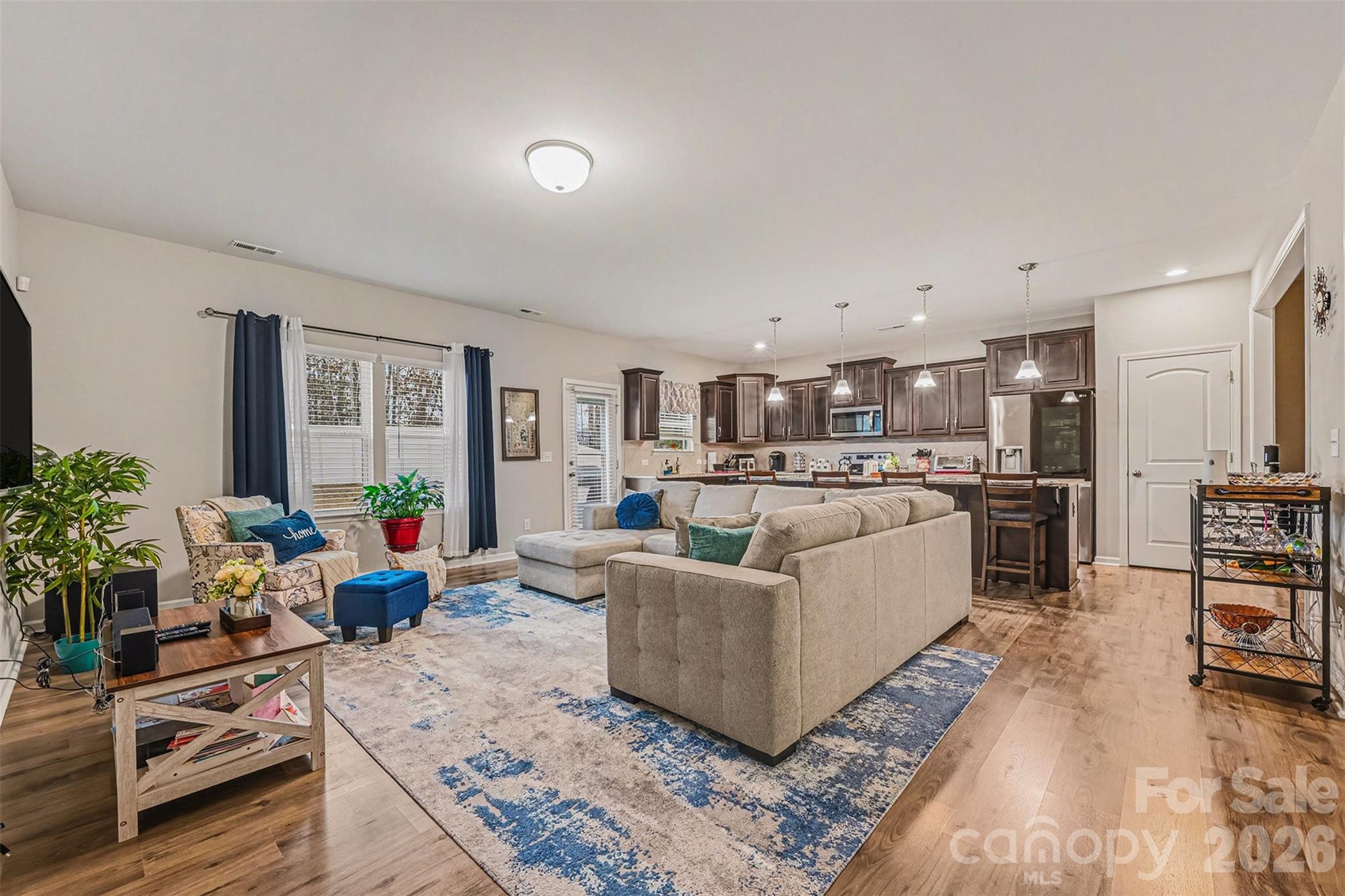 1772 Savannah Lane, Unit 19 Stanfield, NC 28163 - Photo 13 of 29 a living room with furniture and a large window