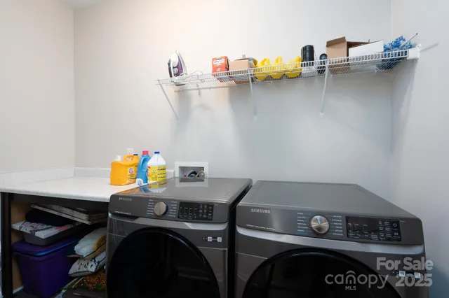 a utility room with dryer and washer