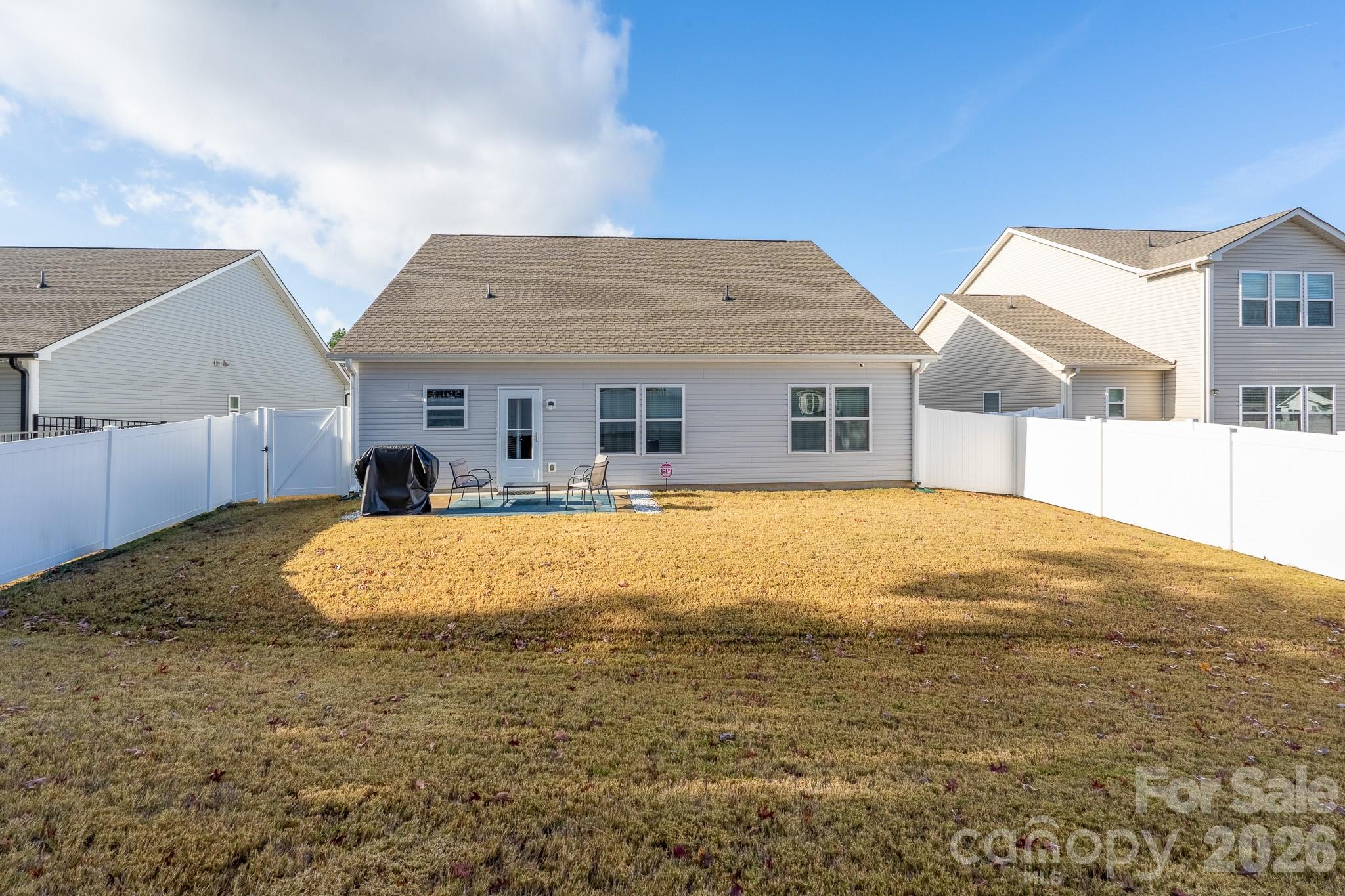 1772 Savannah Lane, Unit 19 Stanfield, NC 28163 - Photo 27 of 29 a view of pool with outdoor seating