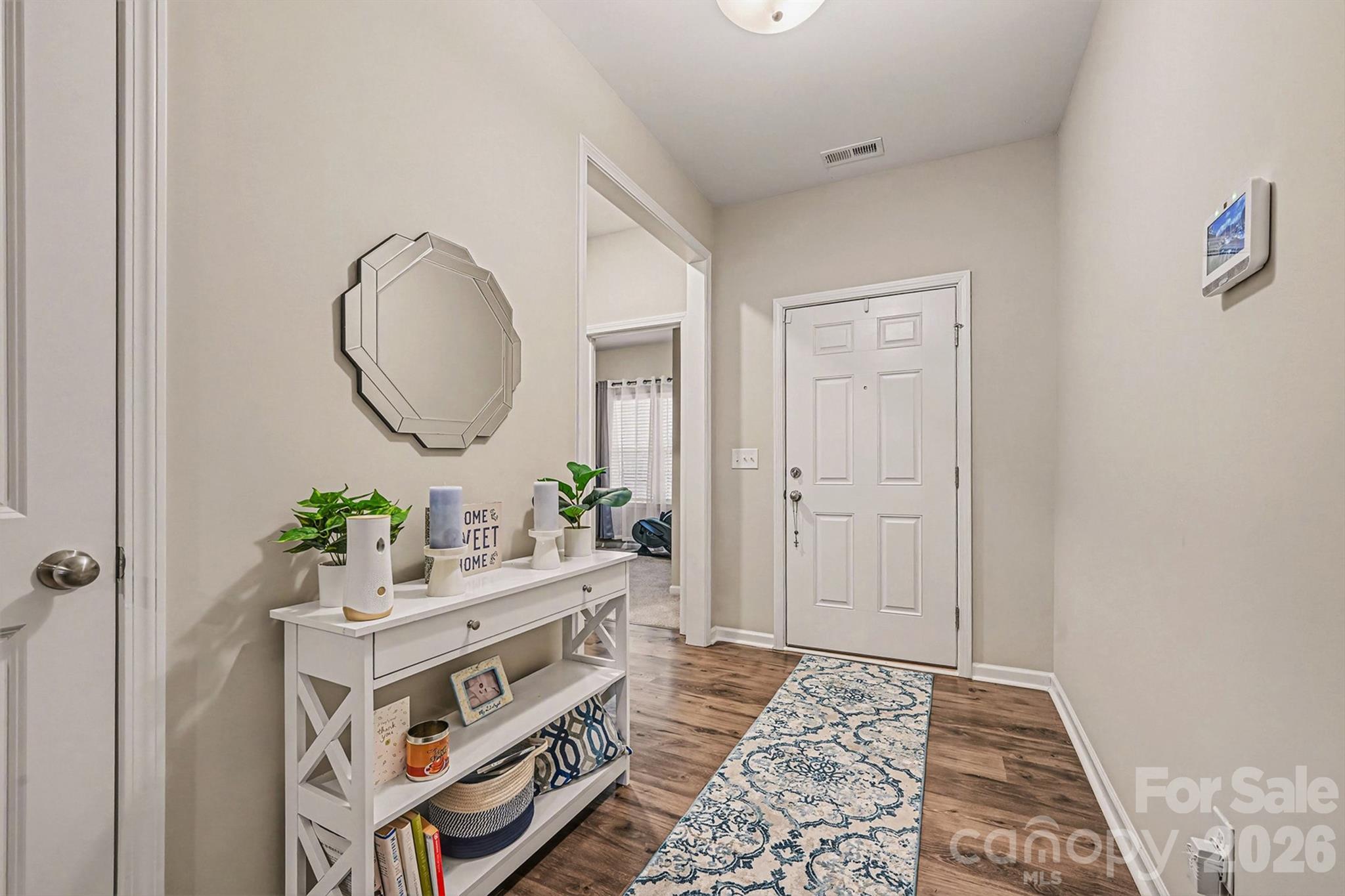 1772 Savannah Lane, Unit 19 Stanfield, NC 28163 - Photo 4 of 29 a living room with furniture