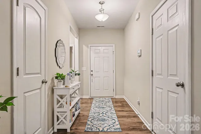 a very nice looking room with wooden floor