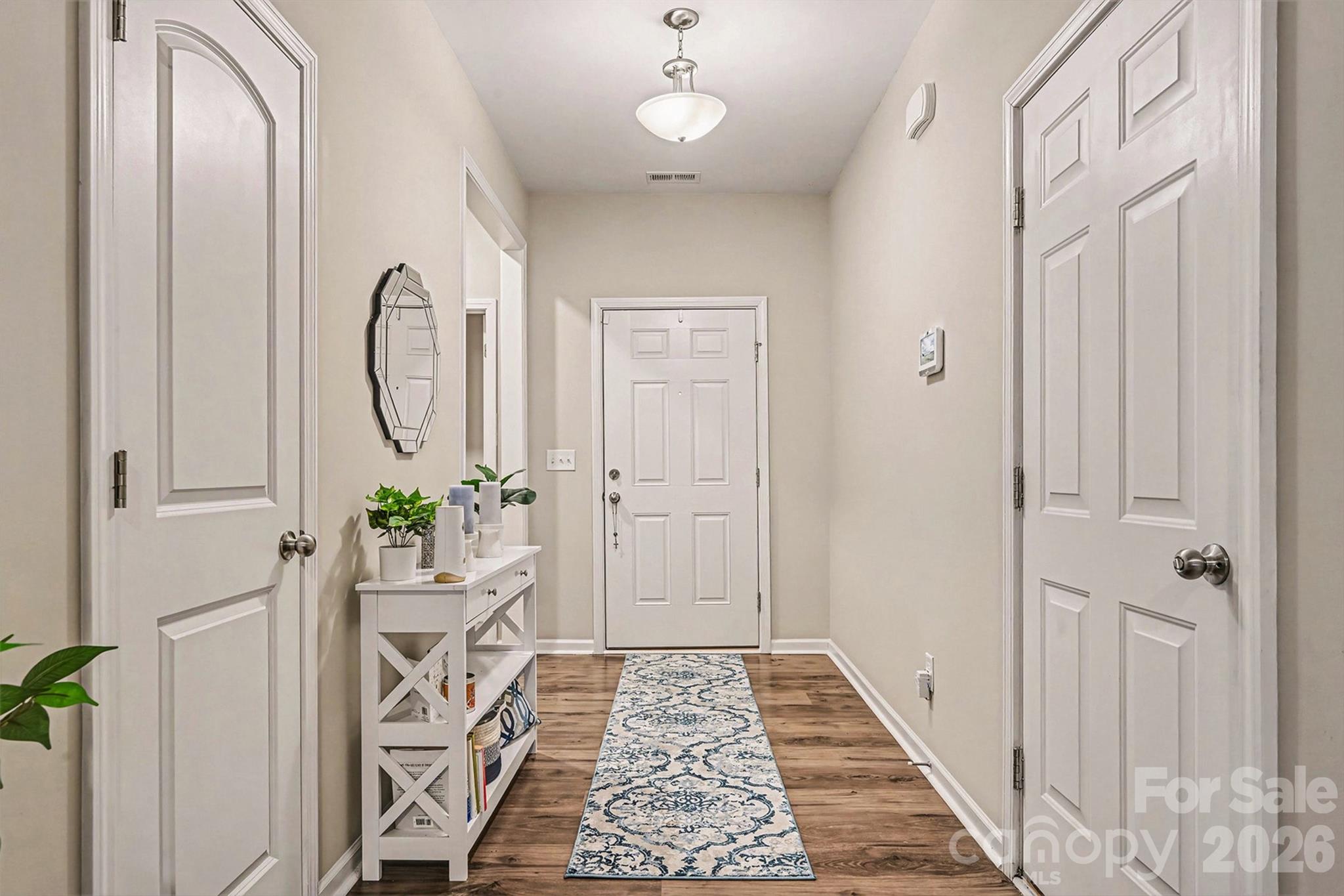 1772 Savannah Lane, Unit 19 Stanfield, NC 28163 - Photo 5 of 29 a very nice looking room with wooden floor
