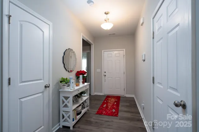 a view of an entryway with a workspace