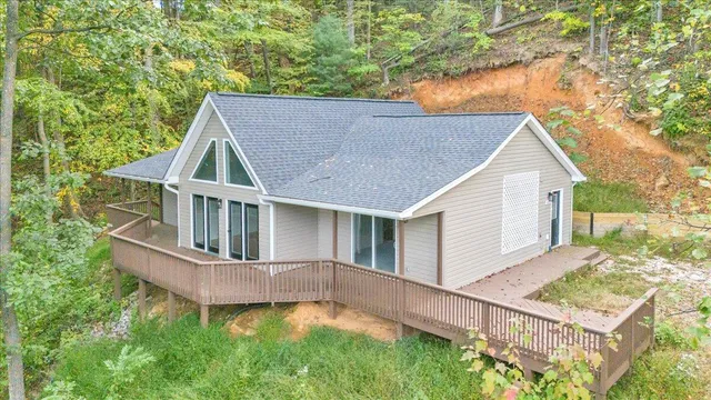 a house with trees in the background