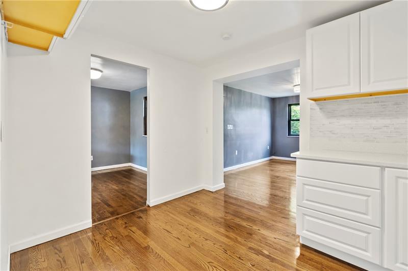 308 Frazier Drive Pittsburgh, PA 15235 - Photo 11 of 29 a view of a room with wooden floor and staircase
