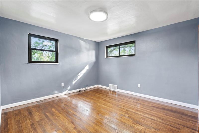 308 Frazier Drive Pittsburgh, PA 15235 - Photo 16 of 29 a view of a room with wooden floor and window