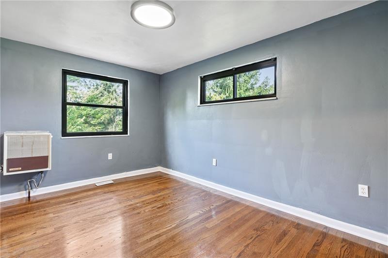 308 Frazier Drive Pittsburgh, PA 15235 - Photo 19 of 29 a view of a room with wooden floor and a window