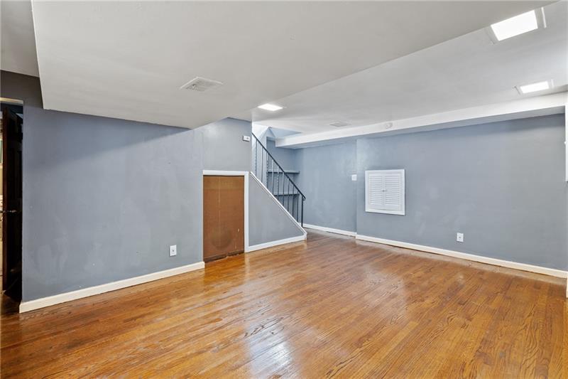 308 Frazier Drive Pittsburgh, PA 15235 - Photo 20 of 29 a view of an empty room with wooden floor