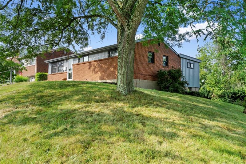 308 Frazier Drive Pittsburgh, PA 15235 - Photo 2 of 29 a house view with a garden space