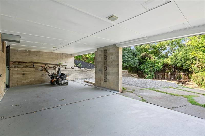 308 Frazier Drive Pittsburgh, PA 15235 - Photo 24 of 29 a view of parking garage with cars
