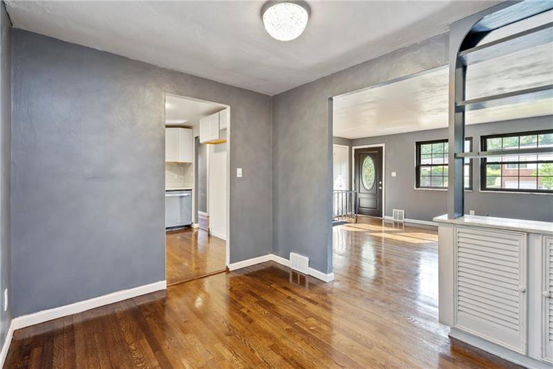 308 Frazier Drive Pittsburgh, PA 15235 - Photo 7 of 29 wooden floor in an empty room with a window
