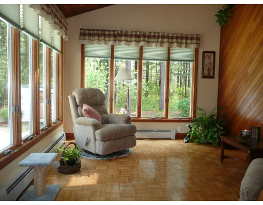 18 Governor Fuller Road Billerica, MA 01821 - Photo 11 of 30 a living room with furniture and a large window