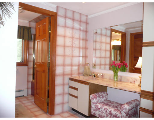 18 Governor Fuller Road Billerica, MA 01821 - Photo 14 of 30 a bathroom with a tub sink and mirror