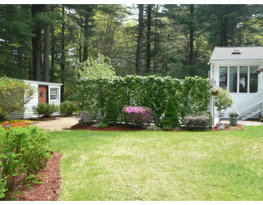 18 Governor Fuller Road Billerica, MA 01821 - Photo 28 of 30 a swimming pool with outdoor seating and yard