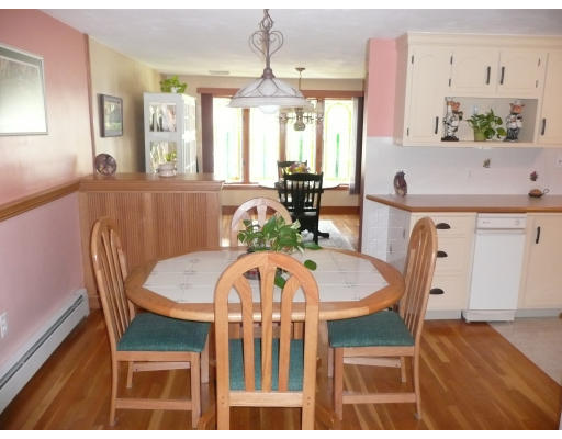 18 Governor Fuller Road Billerica, MA 01821 - Photo 8 of 30 a view of a dining room with furniture window and wooden floor