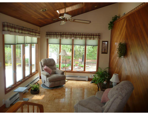 18 Governor Fuller Road Billerica, MA 01821 - Photo 10 of 30 a living room with furniture and a large window