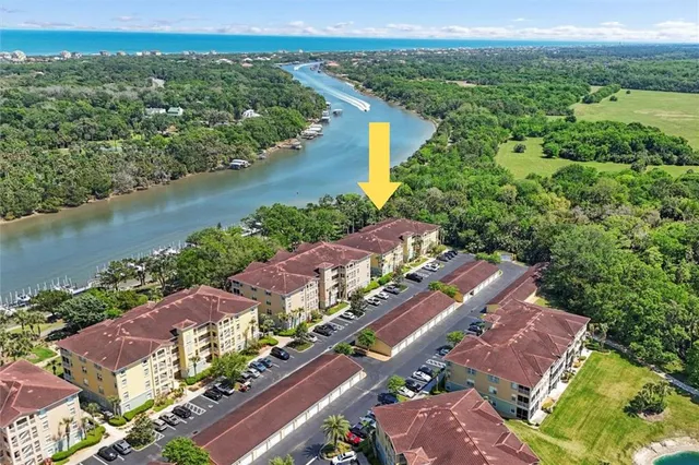 an aerial view of a city with lake view