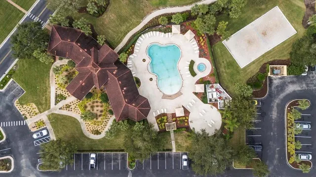 an aerial view of a house with garden space sitting space and swimming pool