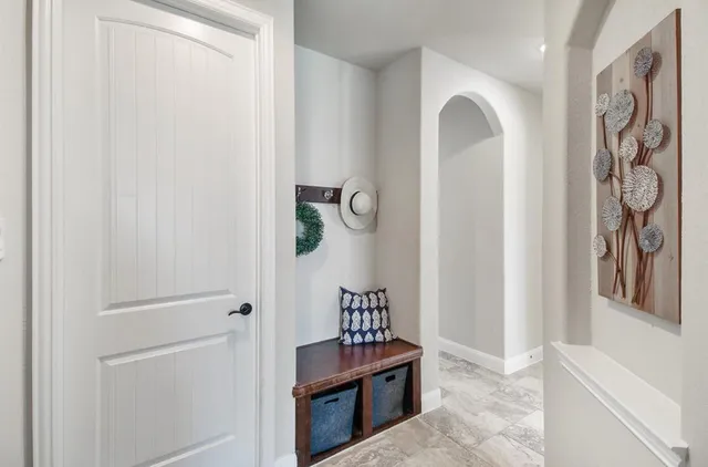 a bathroom with a sink a mirror and vanity