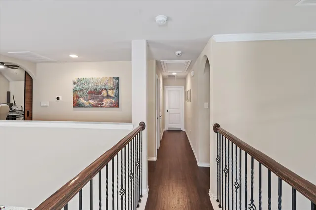 a view of gallery with wooden floor